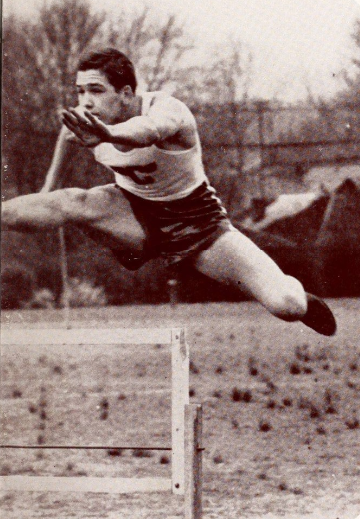 Chunk Simmons clearing a hurdle